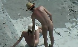 In the buff beachgoers caught fucking on cam