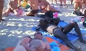Swingers recorded by voyeur beach sex