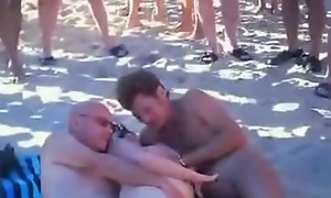 Become man sharing at the beach